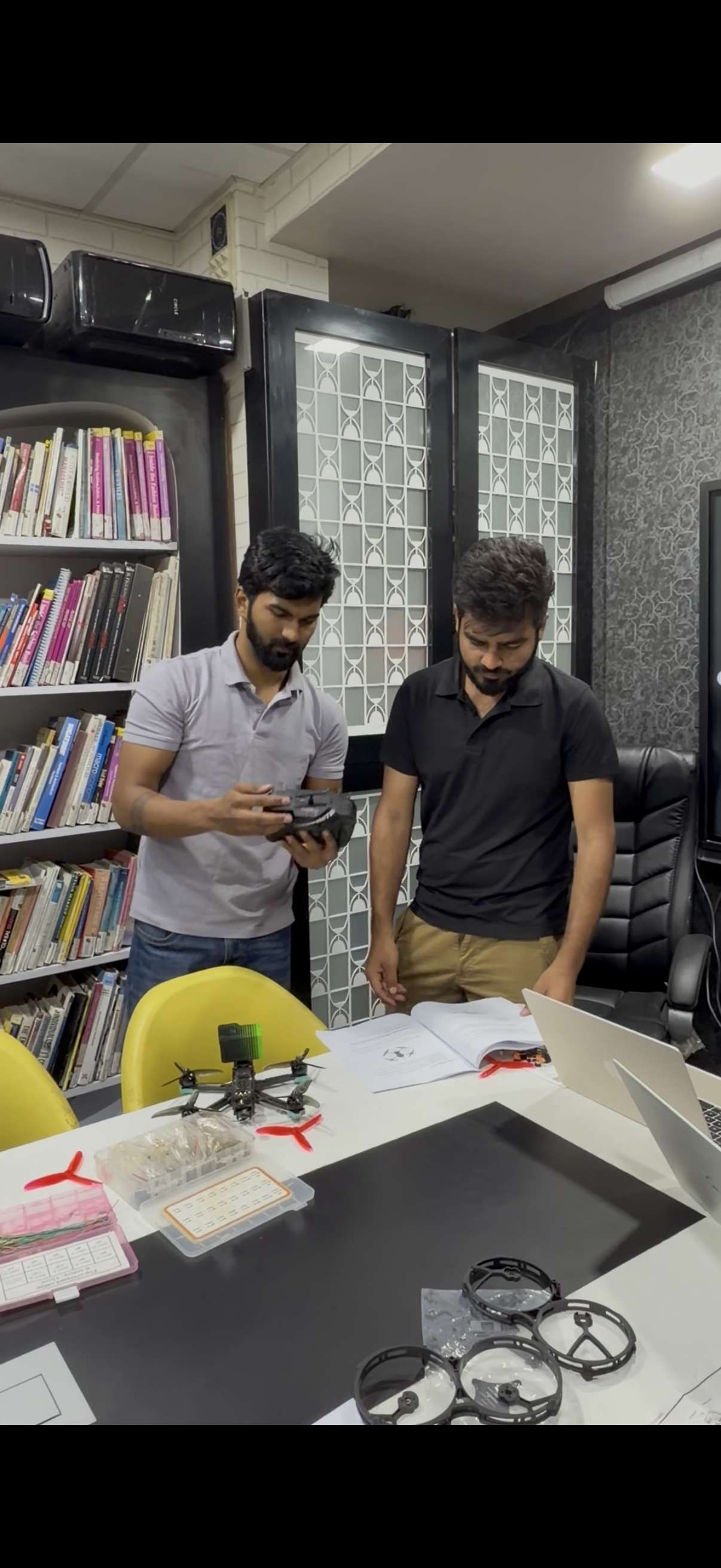 Participants building drones hands-on